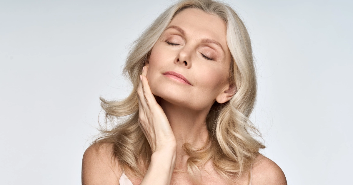 Woman showing reduced wrinkles after Radiesse® treatment in Austin, TX